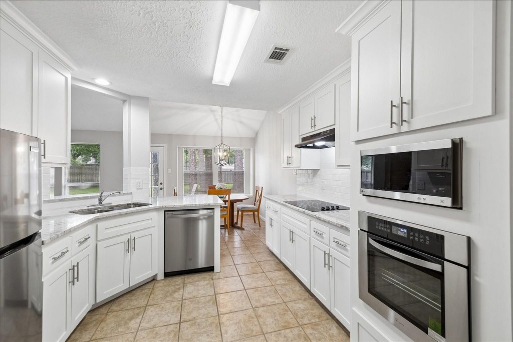Photo of 5106 Village Springs Drive, Kingwood, TX 77339 (MLS # 79380421)