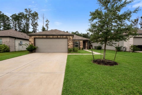Photo of 10061 Spring Creek Road, Cleveland, TX 77327 (MLS # 2163170)