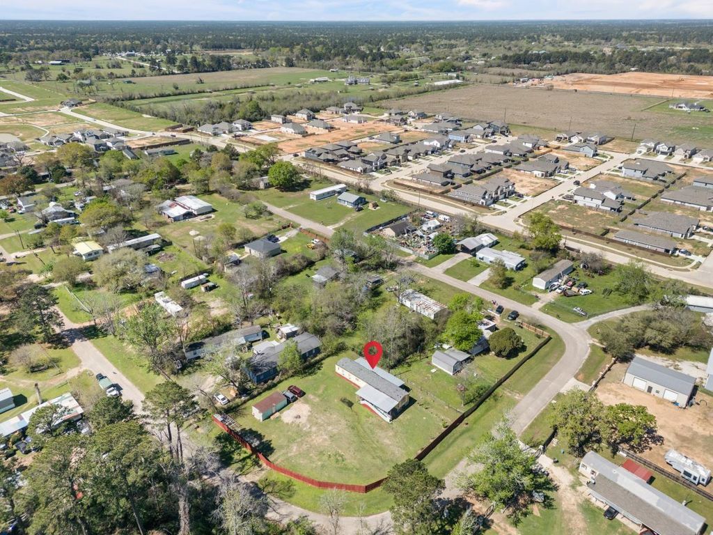 Photo of 606 S S Pine Hill Street, Pinehurst, TX 77362 (MLS # 36799043)