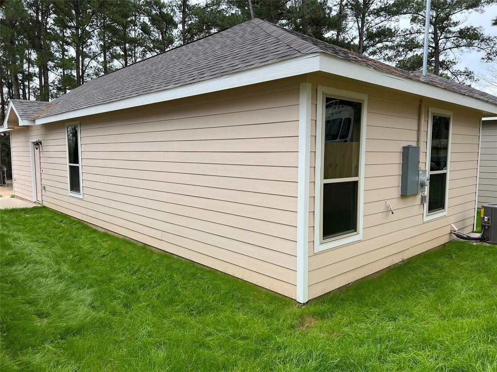 Photo of 11595 Persimmon Street, Willis, TX 77318 (MLS # 13394745)