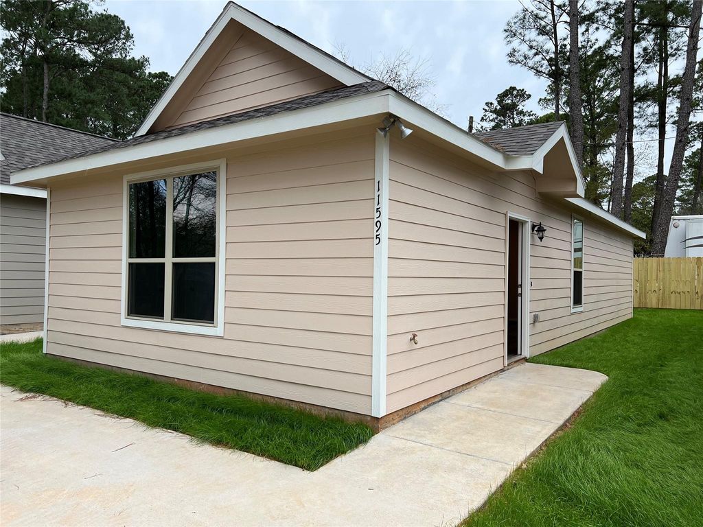 Photo of 11595 Persimmon Street, Willis, TX 77318 (MLS # 13394745)