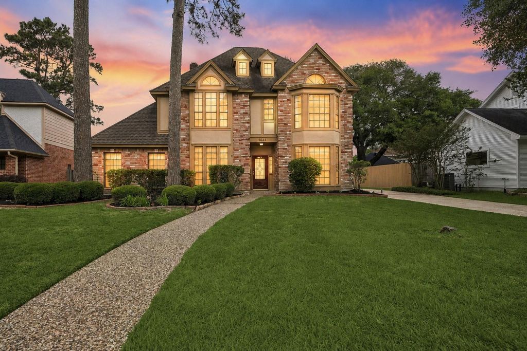 Photo of 5623 Spring Lodge Drive, Houston, TX 77345 (MLS # 45773999)