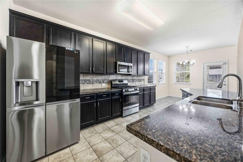 Photo of 366 Lake Line Drive, Alvin, TX 77511 (MLS # 68622885)