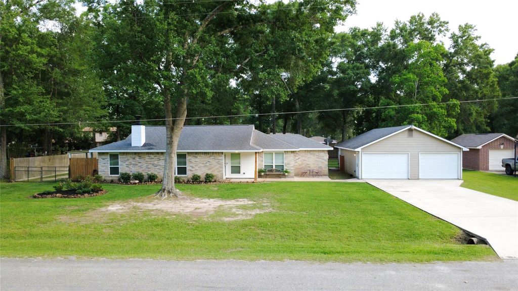 Photo of 218 Holly Lane, Woodbranch, TX 77357 (MLS # 59351042)