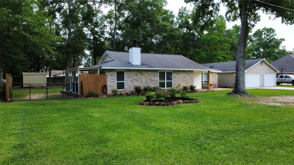 Photo of 218 Holly Lane, Woodbranch, TX 77357 (MLS # 59351042)