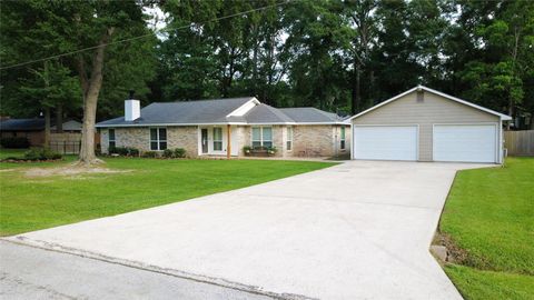 Photo of 218 Holly Lane, Woodbranch, TX 77357 (MLS # 59351042)
