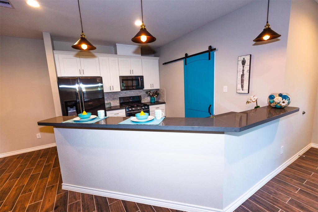 Photo of 507 E Foley Street, Alvin, TX 77511 (MLS # 44488869)
