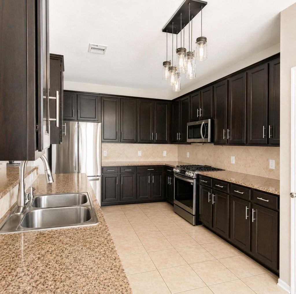 Photo of 8618 Rocky River Street, Baytown, TX 77523 (MLS # 97594493)