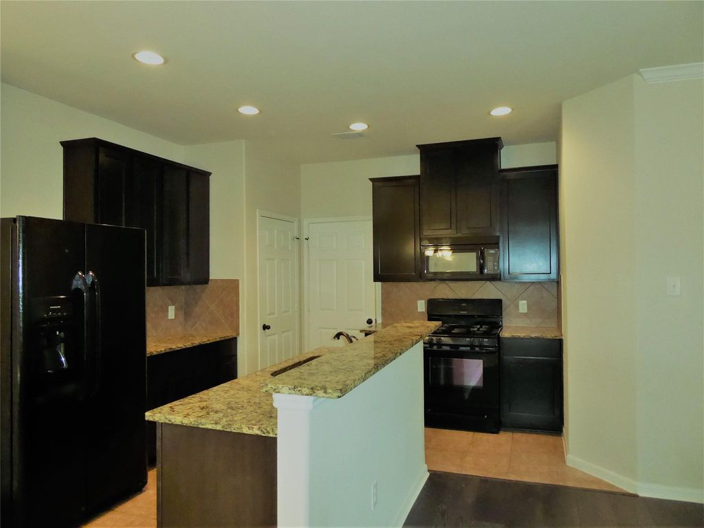 Photo of 6719 Honey Harvest Lane, Houston, TX 77084 (MLS # 64506798)