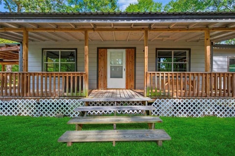 Photo of 450 Dove Creek Dr Dr, Coldspring, TX 77331 (MLS # 71710197)