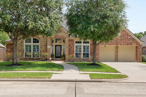 Photo of 13610 Hammond Hills Lane, Houston, TX 77044 (MLS # 72843592)