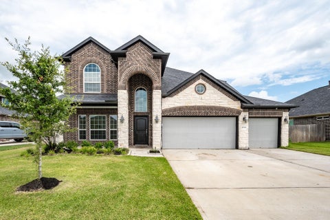 Photo of 11919 Champions Forest Drive, Mont Belvieu, TX 77523 (MLS # 20909891)