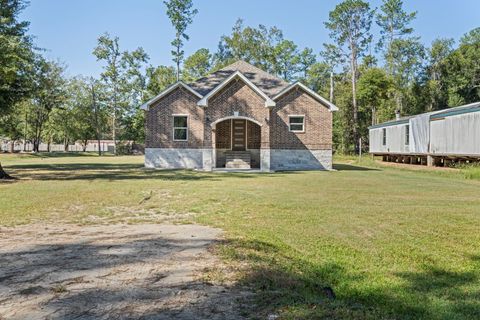 Photo of 138 County Road 3314, Cleveland, TX 77327 (MLS # 74504195) Photo of 138 County Road 3314, Cleveland, TX 77327 (MLS # 74504195)