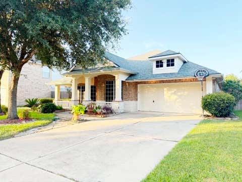 Photo of 17507 N Riata Lake Drive, Cypress, TX 77433 (MLS # 20732444)