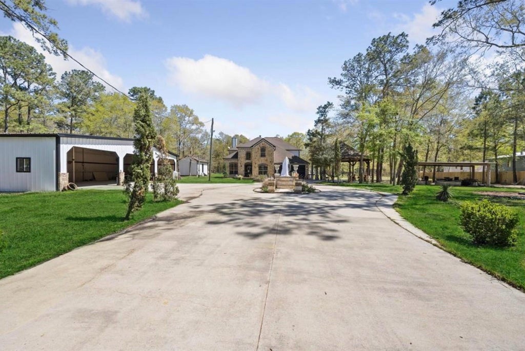 Photo of 826 Oak Bend Lp LOOP, Cleveland, TX 77328 (MLS # 50192723)