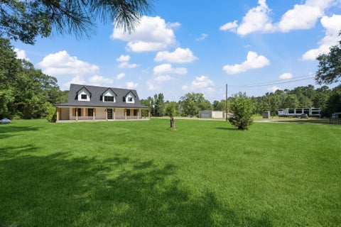Photo of 951 County Road 2298, Cleveland, TX 77327 (MLS # 66886736)
