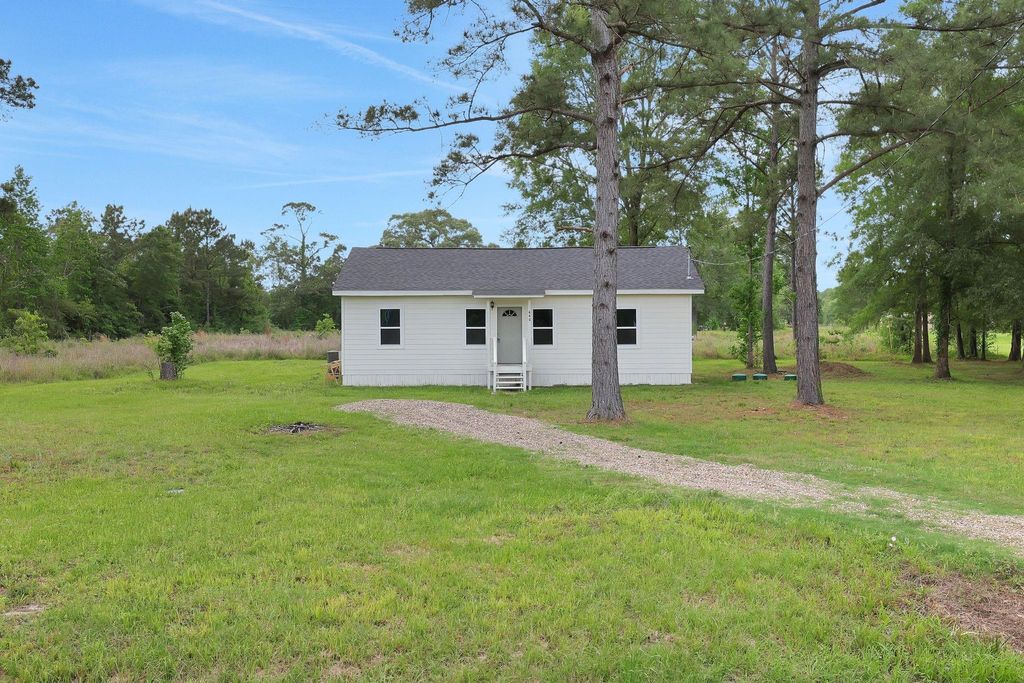 Photo of 440 County Road 2048, Hull, TX 77564 (MLS # 95985901)