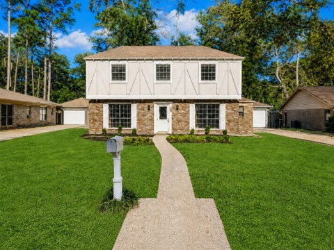 Photo of 2815 Woodland Grove Drive, Houston, TX 77339 (MLS # 18013164)