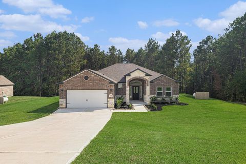 Photo of 9642 Moss Rose Ln, Willis, TX 77378 (MLS # 20964690)