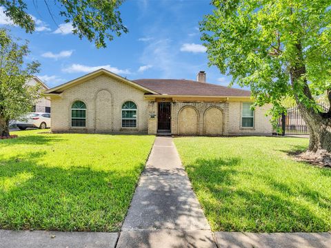 Photo of 9239 Rowan Lane, Houston, TX 77036 (MLS # 88778216)