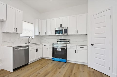 Photo of 8123 Betty Boop Street #A B, Houston, TX 77028 (MLS # 61276894)