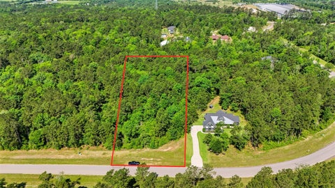 Photo of 15779 Republic Ranch Road N, Willis, TX 77378 (MLS # 54640002)