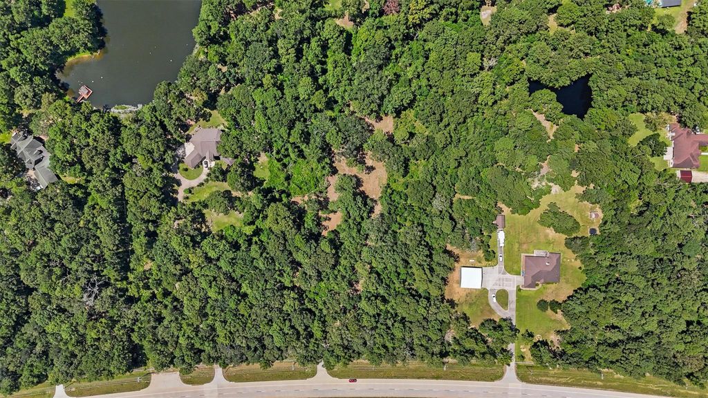 Photo of 21924 State Highway 242, New Caney, TX 77357 (MLS # 45418104)