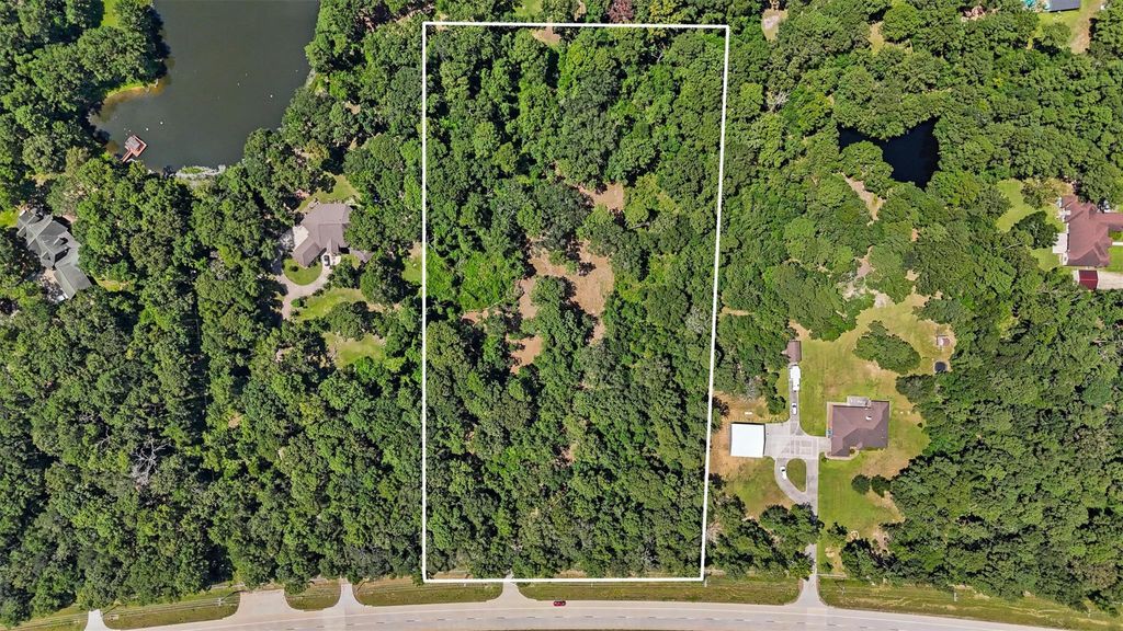 Photo of 21924 State Highway 242, New Caney, TX 77357 (MLS # 45418104)