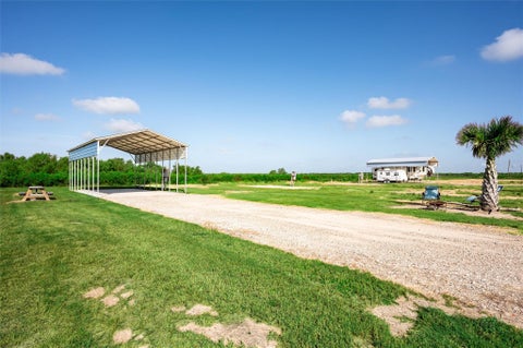 Photo of 1065 Canal, Gilchrist, TX 77617 (MLS # 61552650)
