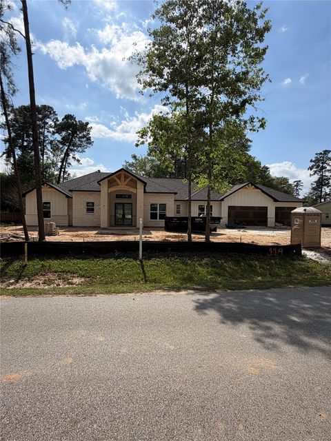Photo of 114 Magnolia Bend Bnd, Roman Forest, TX 77357 (MLS # 85905282)