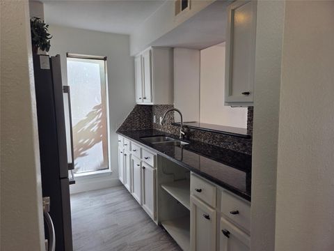 Photo of 10075 Westpark Drive #40, Houston, TX 77042 (MLS # 40606208)