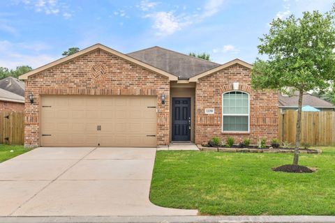 Photo of 12059 Powderhorn Lane, Pinehurst, TX 77362 (MLS # 12632767)