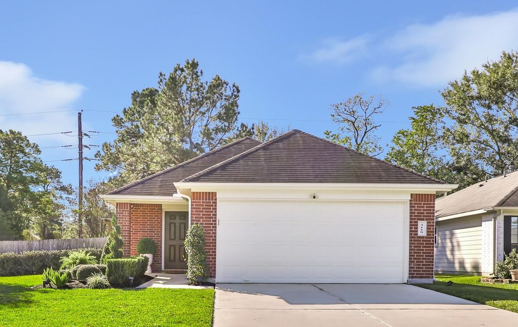 Photo of 3118 This Way Way, Kingwood, TX 77339 (MLS # 20768124)