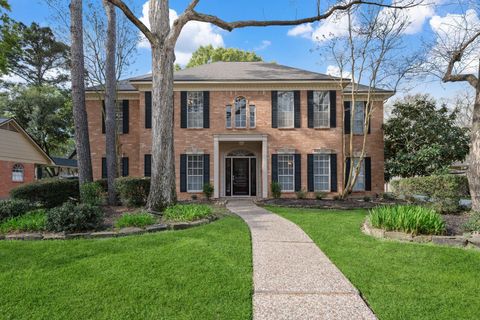 Photo of 1931 Windy Green Drive, Houston, TX 77345 (MLS # 66614136)