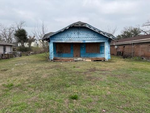 Photo of 5011 Reed Road, Houston, TX 77033 (MLS # 91446668)