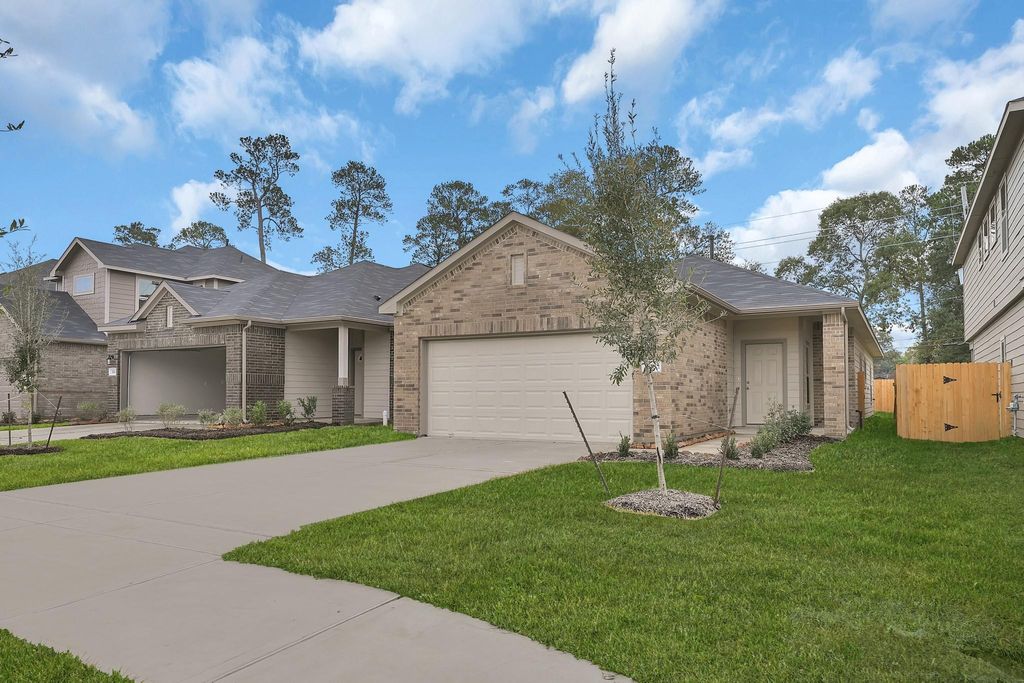 Photo of 216 Emerald Thicket Lane, Huffman, TX 77336 (MLS # 38780794)