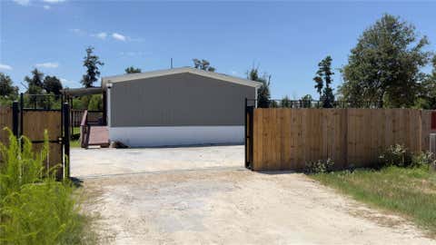 Photo of 7173 Road 5878, Cleveland, TX 77327 (MLS # 54769151)