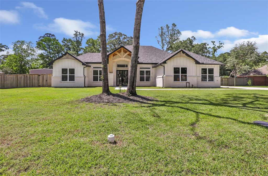 Photo of 2423 Roman Forest Boulevard, New Caney, TX 77357 (MLS # 30861548)