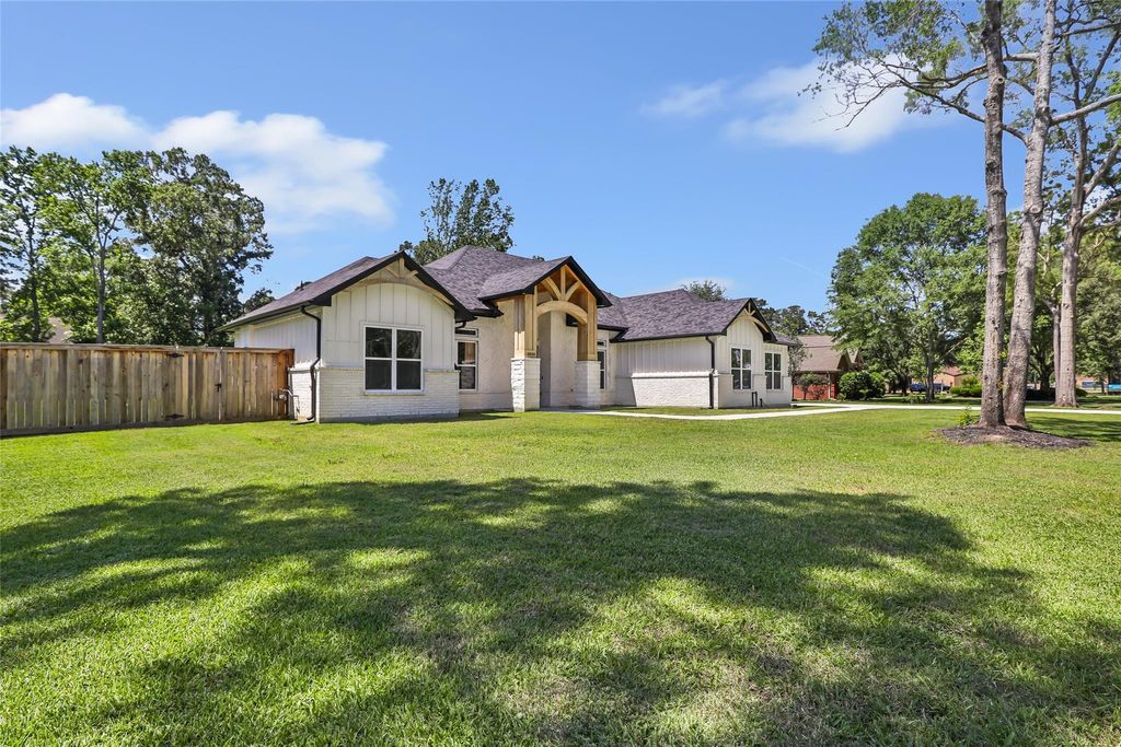 Photo of 2423 Roman Forest Boulevard, New Caney, TX 77357 (MLS # 30861548)