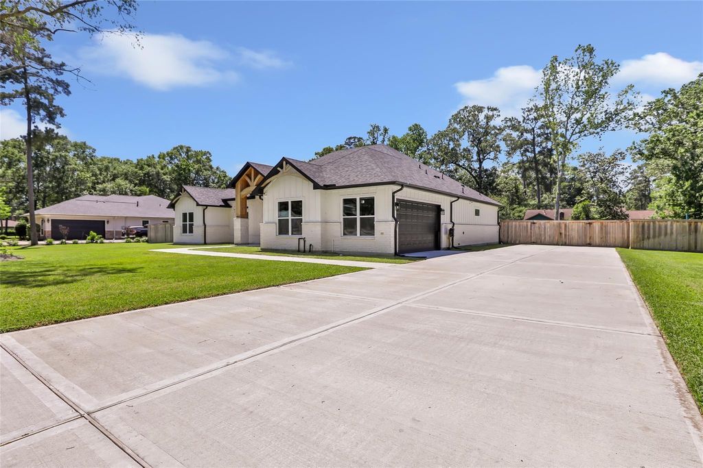 Photo of 2423 Roman Forest Boulevard, New Caney, TX 77357 (MLS # 30861548)