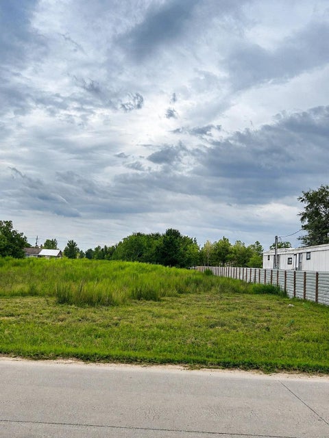 Photo of 1723 County Road 3542, Cleveland, TX 77327 (MLS # 23863381)