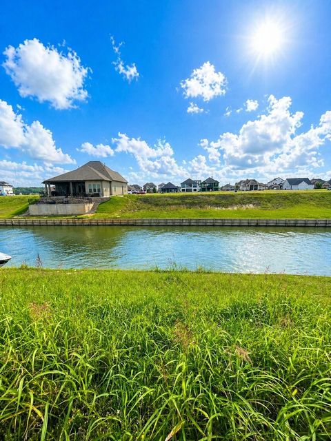 Photo of 10713 S Lake Mist Lane, Willis, TX 77318 (MLS # 6996214)