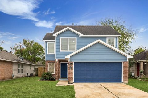 Photo of 5639 Tiger Lilly Way, Houston, TX 77085 (MLS # 27435602)