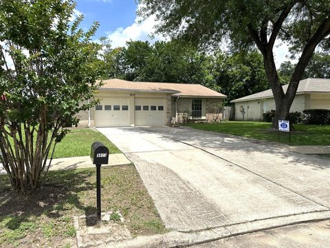 Photo of 9822 Rumbling Wood Lane, Houston, TX 77086 (MLS # 57896459)