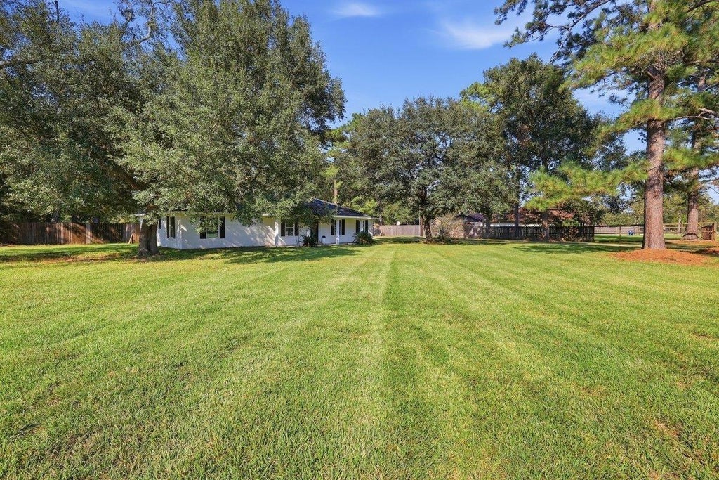 Photo of 13630 Rolling Hills Drive, Beaumont, TX 77713 (MLS # 66198503)