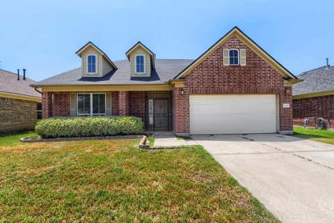 Photo of 14527 Round Mountain Drive, Houston, TX 77090 (MLS # 22282439)