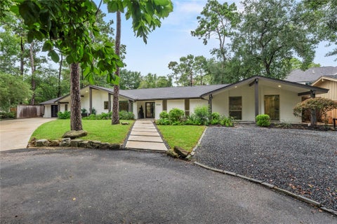 Photo of 12506 Winding Brook Lane, Houston, TX 77024 (MLS # 42233848)