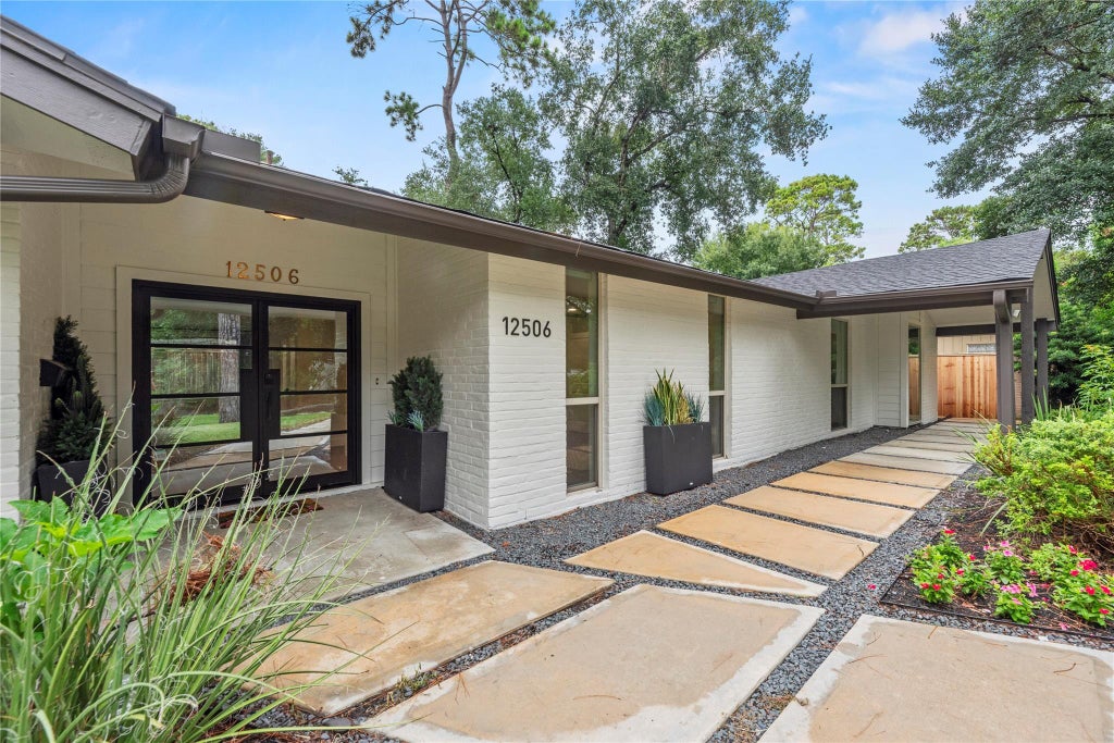 Photo of 12506 Winding Brook Lane, Houston, TX 77024 (MLS # 42233848)
