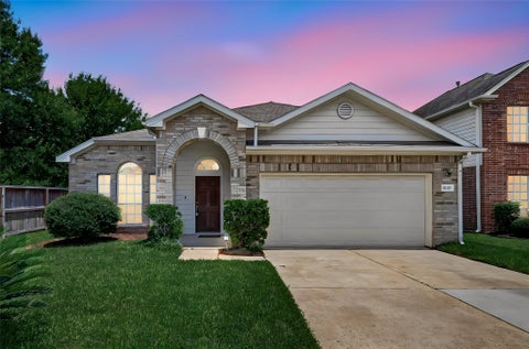 Photo of 10511 Whisper Bluff Drive, Humble, TX 77396 (MLS # 42835721)