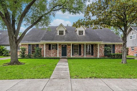 Photo of 7827 Meadowbriar Lane, Houston, TX 77063 (MLS # 39094227)